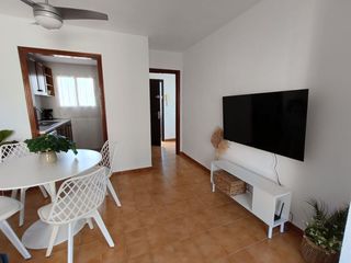Appartement à Carrer xaloc 12. Apartamento cerca del mar con piscina y vistas al mar