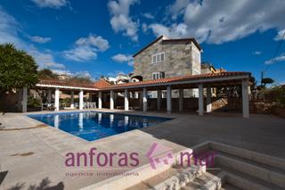 Casa a Els Munts. Casa de 416 m2 en un terreno de 1789 m2. se pueden construido 4