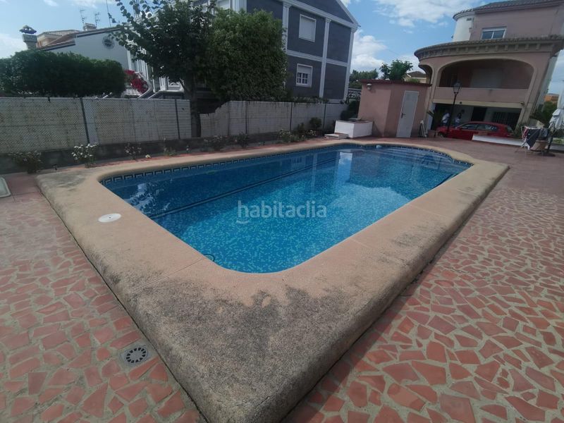 Foto 014fece3-f51c-44ae-b14a-c01246295704. Chalet con riscaldamento parcheggio piscina in Oliva playa Oliva