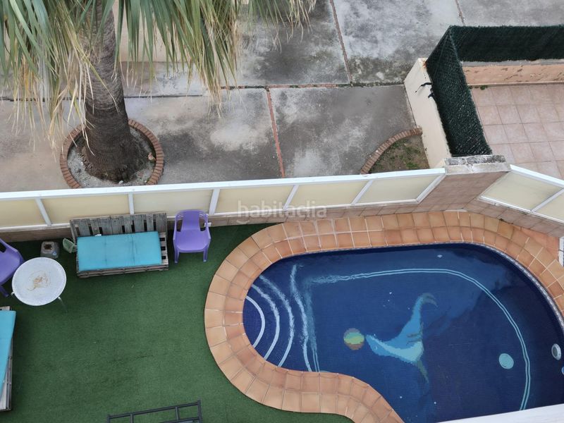 Foto 80831a6d-b247-42b5-8ba3-dc242f82e198. Casa pareada en Oliva playa Oliva