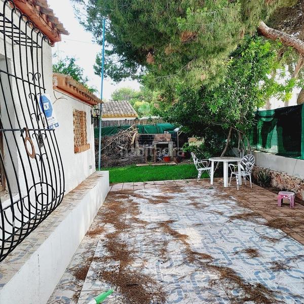 Foto 217a1fbd-171c-4121-8521-7de9aae972e4. Chalet with parking in Punta Prima Orihuela