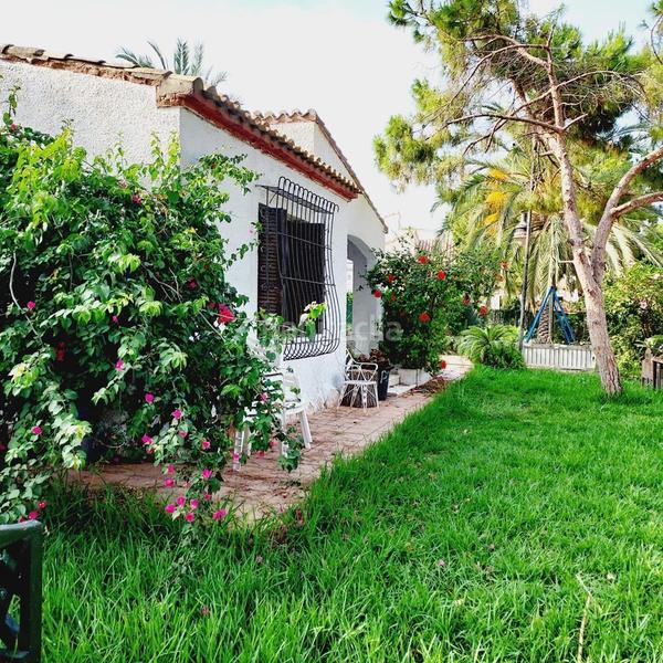 Foto 379be548-7da5-4e9a-bcf9-f57afe0ea694. Chalet with parking in Punta Prima Orihuela