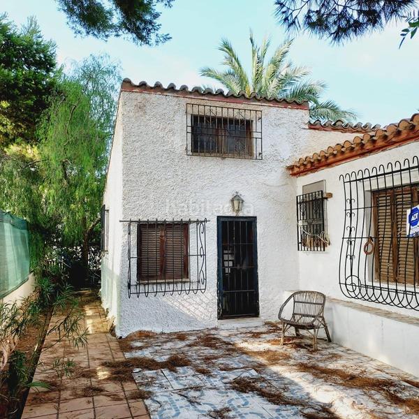 Foto 75e461f4-fcb5-41ef-a1c2-25f8626dd3af. Chalet with parking in Punta Prima Orihuela