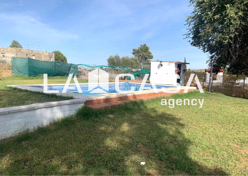 Foto 84bc8f0c-e1cd-41d1-b198-8297427df664. Chalet avec parking piscine dans Sanlúcar la Mayor