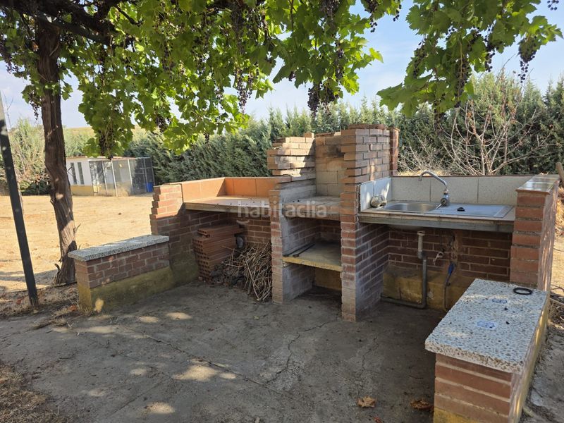 Foto 112d49df-5925-4804-9076-fa09c1d23285. Casa amb xemeneia calefacció aparcament piscina a Illana