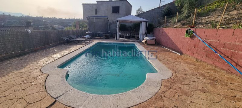 Foto 3977933a-2671-4af7-ae49-01153653880d. Chalet avec piscine dans Residencial Park Maçanet de la Selva