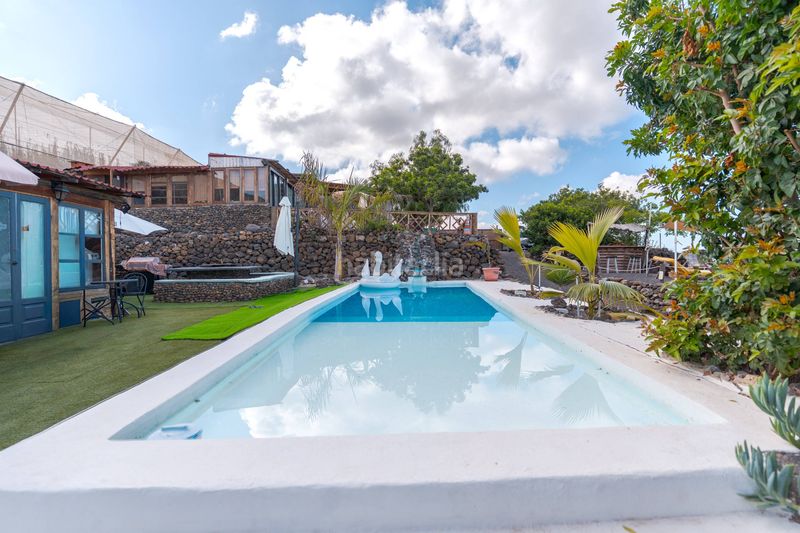 Foto ea2955f4-b7e3-4fd1-a2c4-1c0f15a96d09. Masia amb aparcament piscina a Guía de Isora interior Guía de Isora