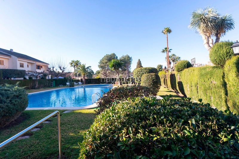 Foto 9f587113-3596-43d1-a531-76c5bee678c1. Casa adossada amb calefacció piscina a La Cañada Paterna