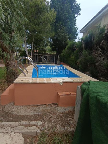 Foto 276f9b0d-7acc-48f6-9c9b-17ec0f94d693. Chalet avec chauffage parking piscine dans Urbanizaciones Llíria