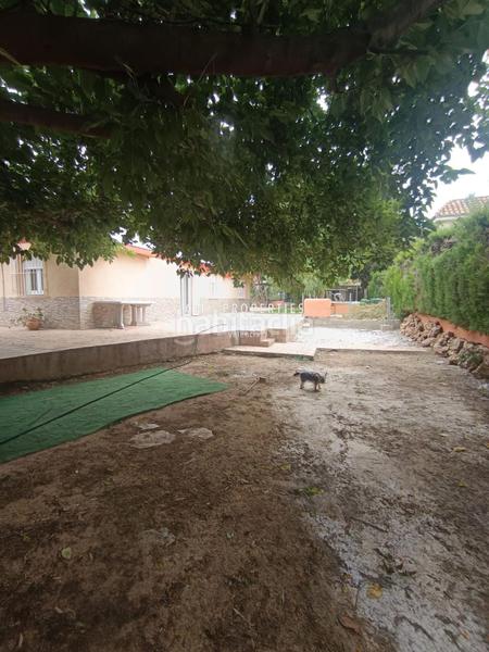 Foto 6091f616-1d44-4760-923c-88c8b104f7b4. Chalet avec chauffage parking piscine dans Urbanizaciones Llíria