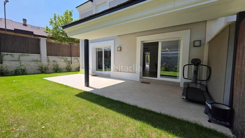 Foto 51df0dd1-23e9-4026-8d75-5ec003549b1f. Casa aparellada amb calefacció aparcament piscina a Boadilla del Monte
