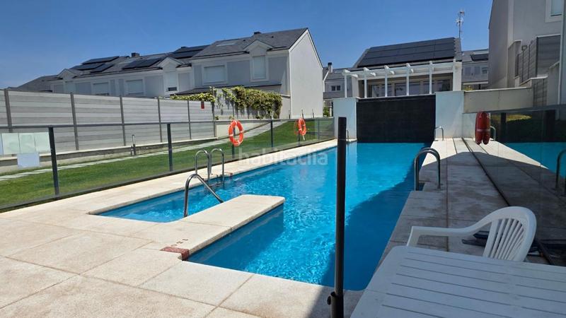 Foto c74a5e9c-b0f5-4977-9064-68e1b8c19ee9. Casa aparellada amb calefacció aparcament piscina a Boadilla del Monte