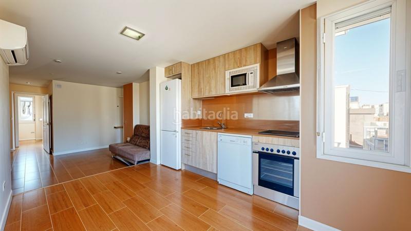 Foto a8bffea8-46f6-49bd-8974-5d8d9d7be823. Ático servicheck vende exclusivo ático dúplex reformado con gran terraza y vistas panorámicas , ubicado en San Diego, puente de en Madrid