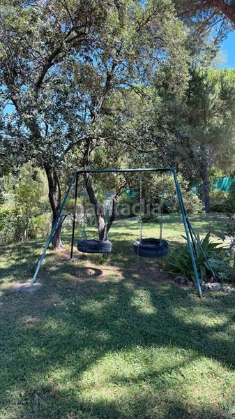 Foto f1f3883d-35a8-4ee8-9dc4-673c2aea7d7e. Xalet amb xemeneia calefacció aparcament piscina a Madrid