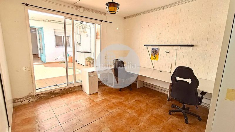 Foto dfaef9cd-d5d4-41c1-bca1-d4c790d8a937. Casa adossada a Barri del Centre Terrassa