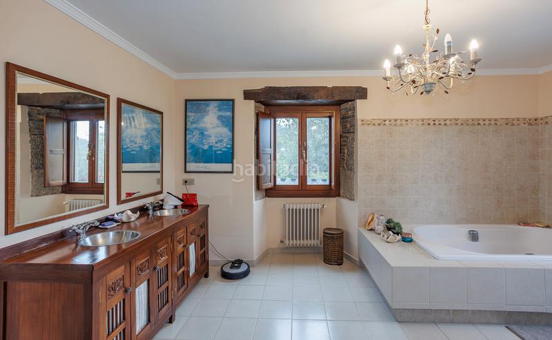 Foto e0e6768f-08b3-498c-bad0-e61bdbe18731. Chalet mit pool in Parroquias del Este Lugo