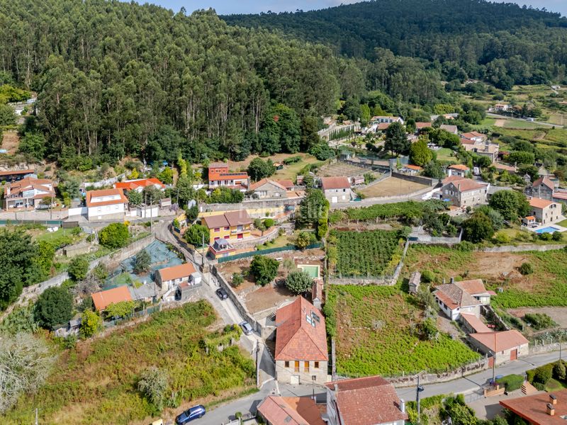 Foto a733a81c-623d-4825-a1d8-9e4aec4d18fe. Masia amb piscina a Samieira Poio
