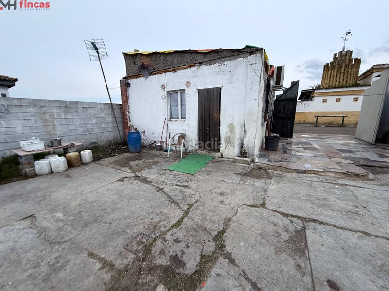 Foto 02d6f832-4681-4e10-a2ae-846a9dc20801. Masía parcela de 1.250m en los naranjos, pozo propio, luz y construcciones para reformar en Carmona