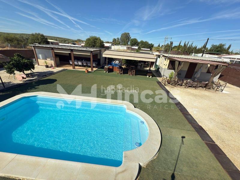 Foto 26d4de25-4746-4fe3-b2b4-71c625880a8b. Masía tu oasis privado por menos de lo que imaginas piscina, jacuzzi y casa de invitados incluidos! en Arahal