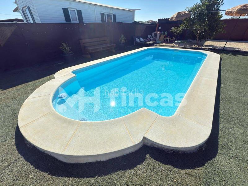 Foto b4d68c5b-07c3-4430-a451-a818e73a1483. Masía tu oasis privado por menos de lo que imaginas piscina, jacuzzi y casa de invitados incluidos! en Arahal