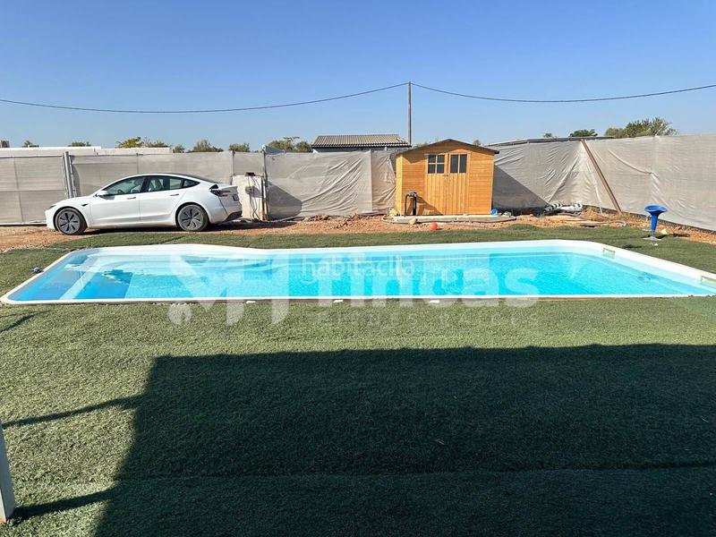 Foto c453d6c8-53dd-41e2-a293-854021ceb672. Mas avec parking piscine dans Algaba (La)