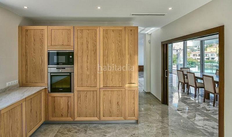 Foto 10db66d0-cab8-48eb-a7be-7032ad9f18a6. Chalet extraordinario chalet en primera linea de playa en Calp