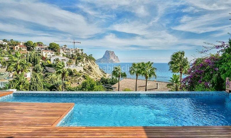 Foto cafe4bdf-4a81-4444-a1cf-7e72d3c20746. Chalet extraordinario chalet en primera linea de playa en Calp