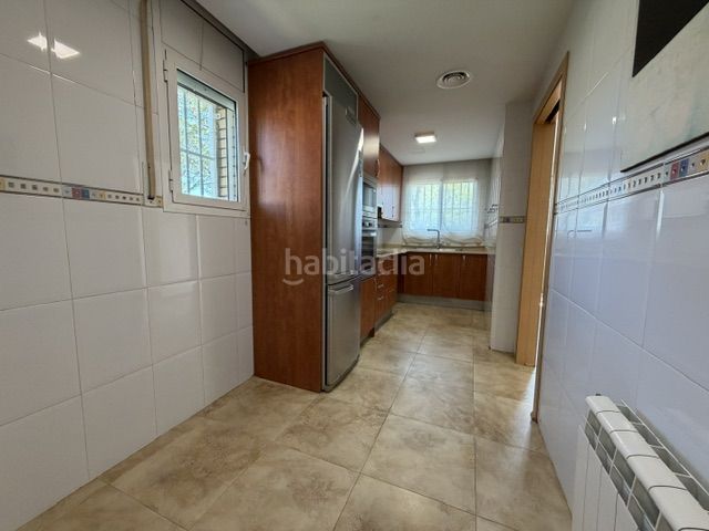 Foto 04c926ad-5edc-4e52-bbe9-d0d3070069fc. Casa adossada amb aparcament a Migjorn Reus
