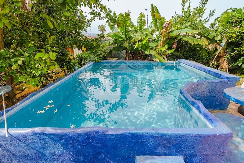 Foto a33f6a1b-0b3e-41f5-afc6-e78082c36be6. Casa amb xemeneia aparcament piscina a Matanza de Acentejo (La)
