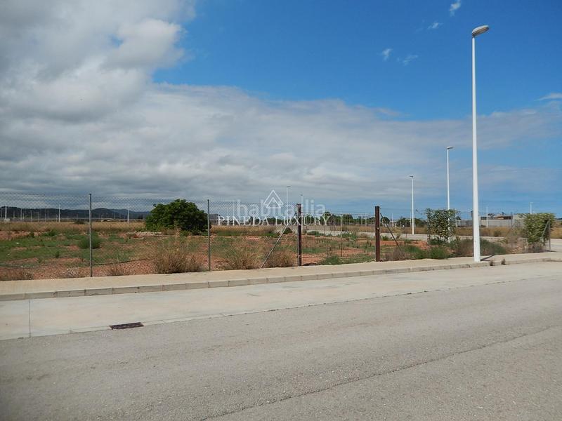 Foto 8d9f6c0b-3966-4a82-98fd-60f49ac7c2cf. Terreno residencial parcela uso rterciario con 100 metros de fachada en Puçol