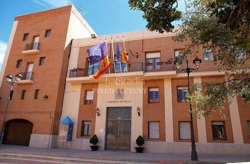 Foto 1c60a7ab-df16-46e5-a96c-30f3a98efb77. Solar industrial parcela industrial con fachada a 3 calles en Puçol