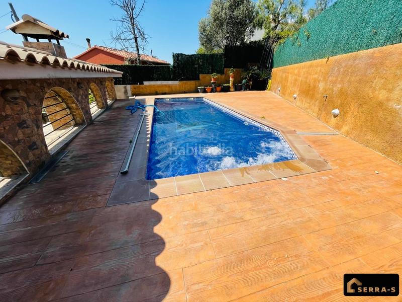 Foto bb50169a-3ac0-4e71-82af-e26411da0ec5. Chalet espectacular chalet en mas mora dos viviendas en una, con piscina y zona de barbacoa en Tordera