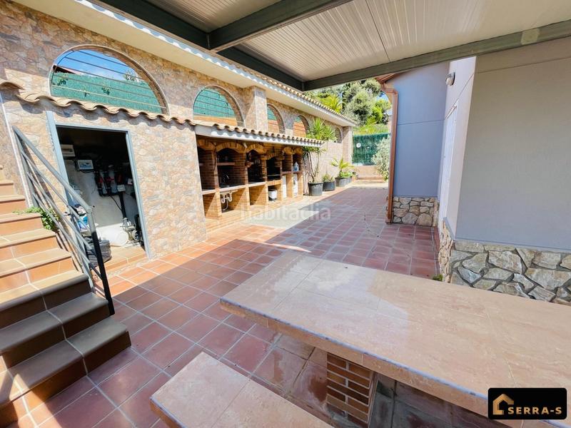 Foto d4b4c412-721d-4ff9-b76c-63a8fe8a4f50. Chalet espectacular chalet en mas mora dos viviendas en una, con piscina y zona de barbacoa en Tordera
