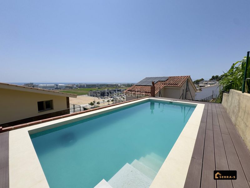 Foto 09739abc-93d6-4dbf-a7e7-e4d7363cb9fb. Xalet amb aparcament piscina a Santa Susanna
