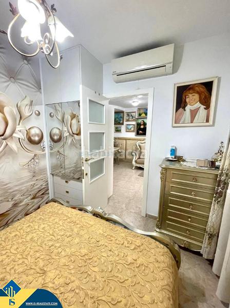 Foto 22f9bfa2-16b5-4e9a-9f4c-c8fd1aeb23de. Casa aparellada amb piscina a Playa Flamenca Orihuela