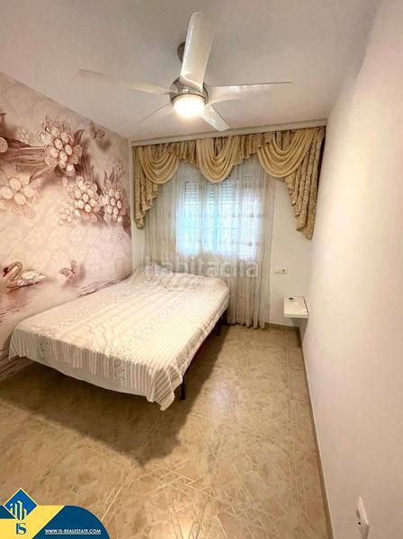 Foto 51f5d4b8-5707-45d7-8a6f-de8a0f1e1280. Casa aparellada amb piscina a Playa Flamenca Orihuela