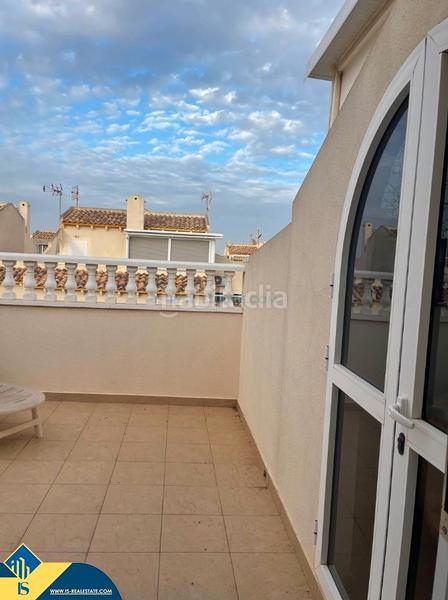 Foto ad264904-6417-4682-8dfe-eb3eca573800. Casa aparellada amb piscina a Playa Flamenca Orihuela