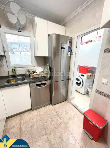 Foto e340cb8c-9a5b-4828-9f2a-3581ad55d4a8. Casa aparellada amb piscina a Playa Flamenca Orihuela