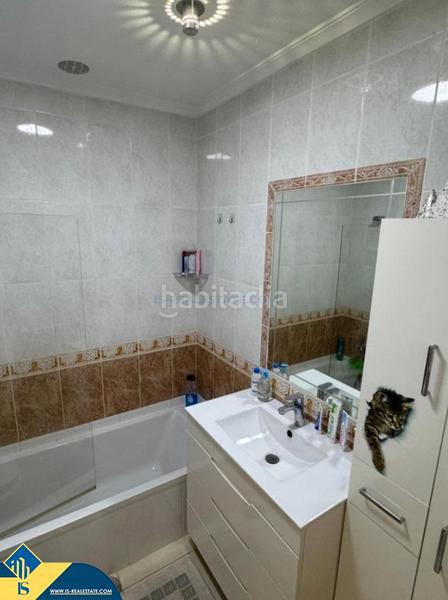 Foto f1748388-d349-4ada-b135-7de2393ee2f2. Casa aparellada amb piscina a Playa Flamenca Orihuela