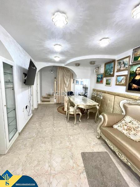 Foto f3d8692c-0534-41bf-ae8a-e62aa998f35a. Casa aparellada amb piscina a Playa Flamenca Orihuela