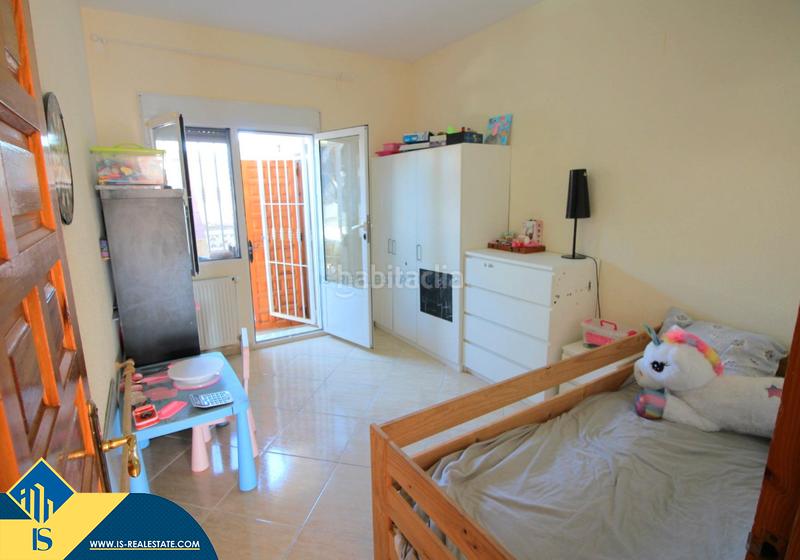 Foto 9867c5b2-0110-43af-b802-e84e7559114c. Chalet with fireplace heating parking pool in La Florida Orihuela