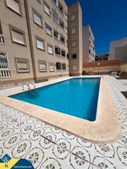 Apartment in Las Piscinas Naturales. Apartamento con piscina compartida, en la provincia de alicante,