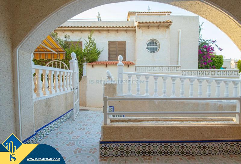 Foto 95b1731f-9c7a-47ee-b774-6c5ad821f4ea. House with fireplace heating pool in Los Balcones-Los Altos Torrevieja