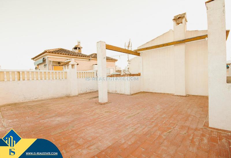 Foto c336aa2c-a922-49ca-a79f-67c786862d83. House with fireplace heating pool in Los Balcones-Los Altos Torrevieja
