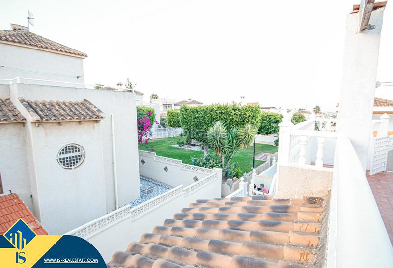 Foto e1657b4b-4cb8-48ab-bc35-c2c585991bc5. House with fireplace heating pool in Los Balcones-Los Altos Torrevieja