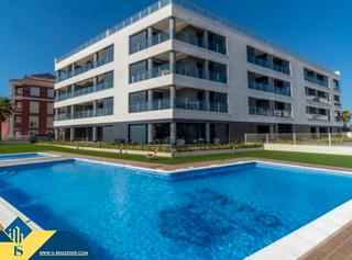 Appartement à Gaspar Perelló. Apartamento con piscina compartida en la provincia de alicante,
