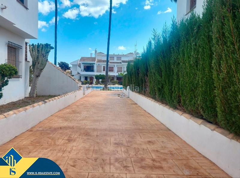 Foto d124b07f-009b-41d7-9743-33fbff2b4c59. Casa con parcheggio piscina in Pueblo Latino Pilar de la Horadada