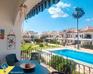 Maison à Pueblo Latino. Bungalow con piscina compartida en orihuela costa, provincia de