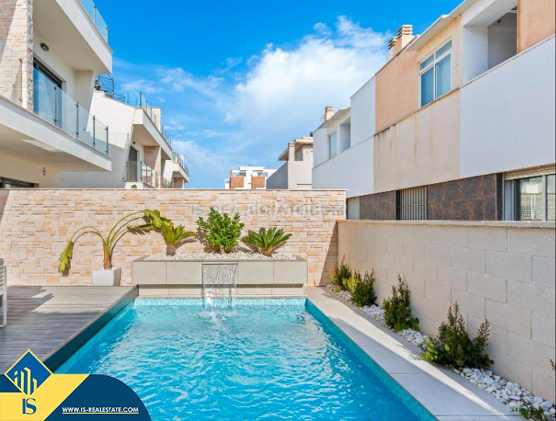 Foto 0209a3bc-2cf0-4fdc-88b5-8f607ebc2ff2. Chalet avec parking piscine dans Los Secanos Guardamar del Segura