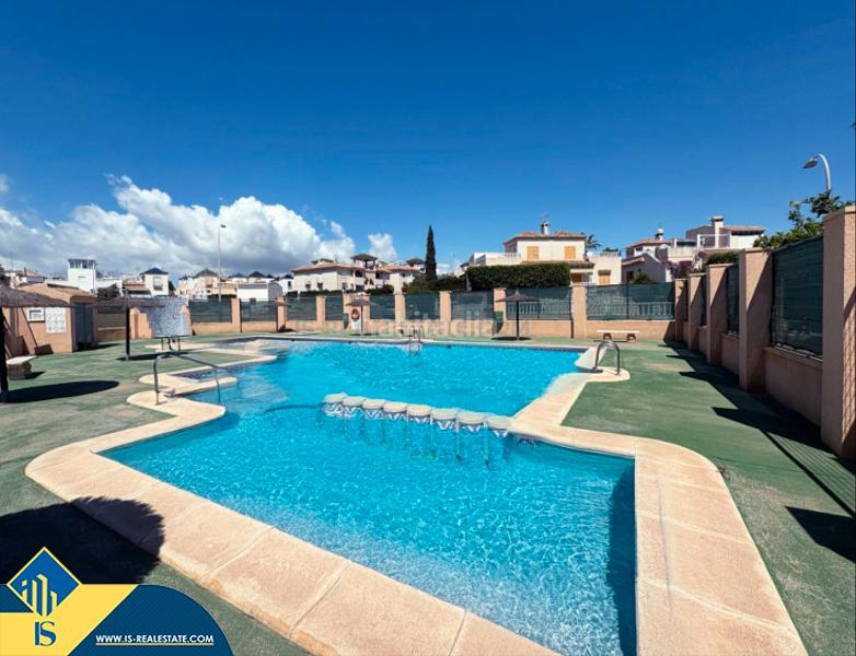 Foto df63acc6-fd1d-47c1-a748-760976d72e84. Casa bifamiliare con parcheggio piscina in Los Balcones-Los Altos Torrevieja